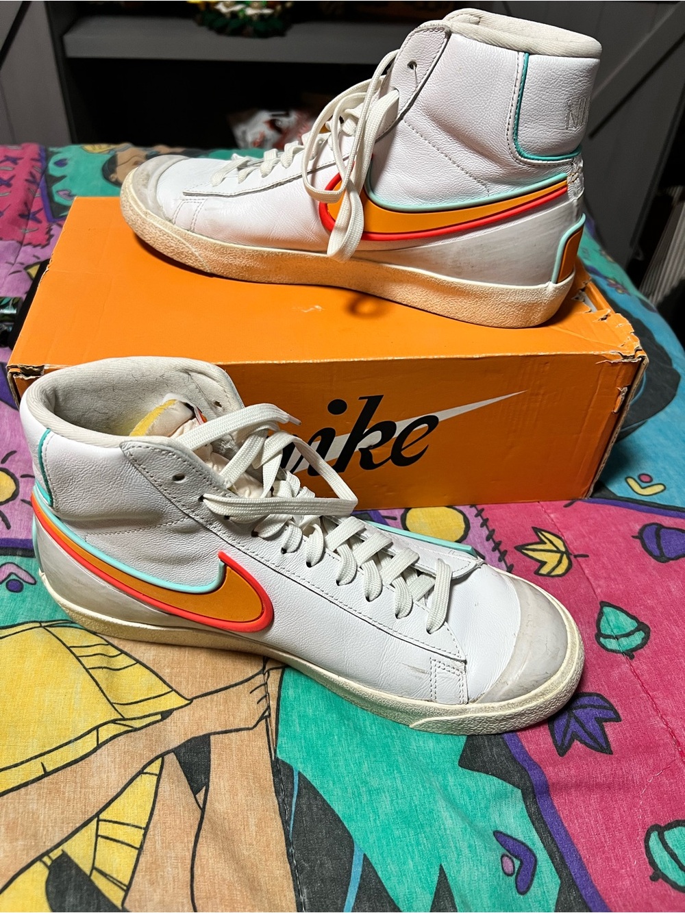Nike White High-Top Sneakers with Red-Orange-Yellow Multicolor Swoosh